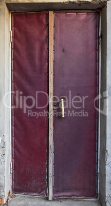 old entrance door to the room with a handle