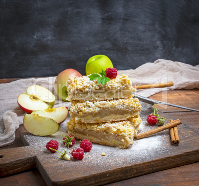 stack of baked slices of pie with apples