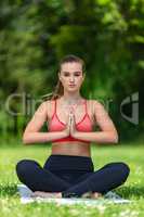 Female Young Fit Healthy Woman or Girl Practicing Yoga Outside