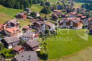 Landscape with the small mountain town of Wengen in the summer, the view from the top. Switzerland