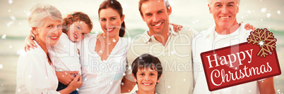 Composite image of beautiful family at the beach