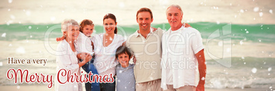 Composite image of beautiful family at the beach