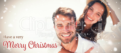 Composite image of man doing piggy-back to girlfriend