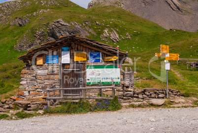 old stone Chalet on the shore of a small lake in the Alpine mountains. Grindelwald Switzerland