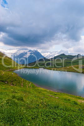 Great view of the rocky mountains. Popular tourist attraction. Location place Bachalpsee in Swiss Alps, Grindelwald valley, Bernese Oberland, Europe