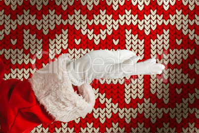 Composite image of santa claus making hand gesture