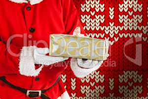 Composite image of santa claus holding a gift box