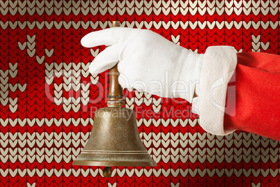 Composite image of cropped image of santa claus holding handle bell