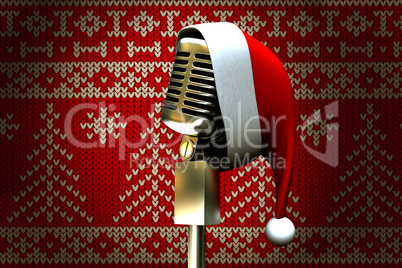 Composite image of retro microphone with santa hat