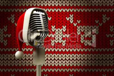 Composite image of retro microphone with santa hat