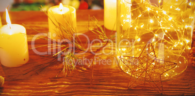 Cozy Christmas ornaments on wooden table