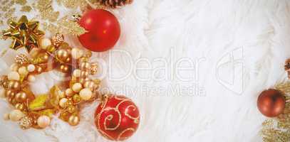 Christmas decoration lying on fur carpet