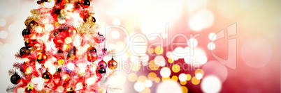 Composite image of shimmering christmas tree of lights