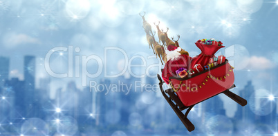 Composite image of high angle view of santa claus riding on sled during christmas