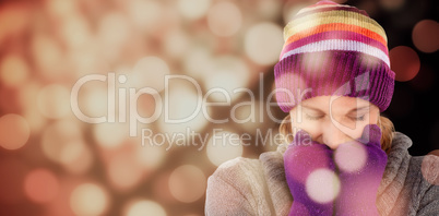 Composite image of freeze woman with gloves and a hat
