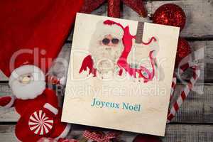 Composite image of  black wooden frame and christmas ornament