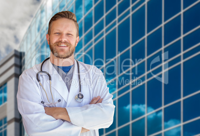 Handsome Young Adult Male Doctor With Beard In Front of Hospital