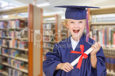 Cute Young Caucasian Boy Wearing Graduation Cap and Gown in The