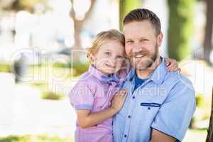 Young Caucasian Father And Son Portrait At The Park
