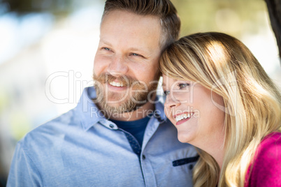 Young Adult Caucasian Couple Portrait At The Park