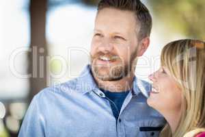 Young Adult Caucasian Couple Portrait At The Park