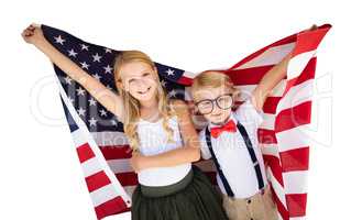 Cute Young Cuacasian Boy and Girl Holding American Flag Isolated