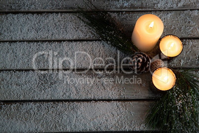 copy space in the snow with candles