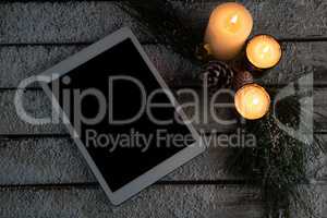 digital tablet with candles