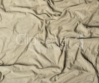 crumpled cotton fabric of gray color, abstract background