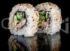 Closeup two sushi rolls california