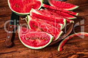 Watermelon slices lying on the cutting board
