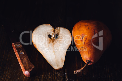 Golden Pear and Knife