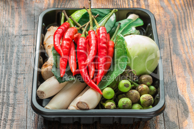 Ingredients set for Thai cooking in pallet on wooden table
