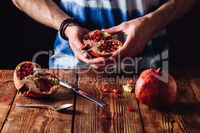 Pomegranate Half in the Hands