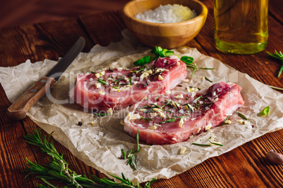 Twu Rib Steak Prepared with Spices for Frying