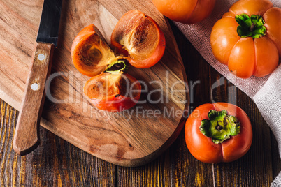 Persimmon Slices on Cutting Board