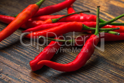 Thai Bird's Eye Chilis on a old wooden table