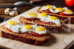 Toasts with Fried Eggs on Cutting Board