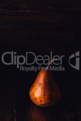 One Pear on Dark Background