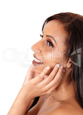 Gorgeous woman in close up with hand on face