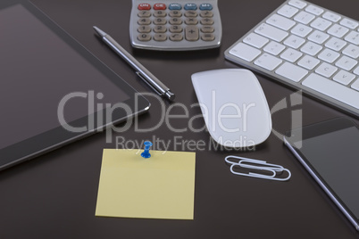 Office desk with digital tablet and smartphone