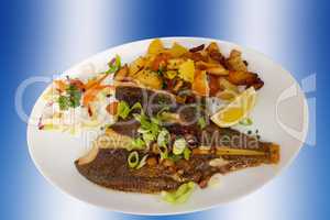Fish dish-fried fish fillet and vegetables