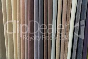 A wide selection of velour and velvet fabrics in the store.