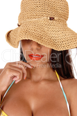 Mystery woman with straw hat in close up