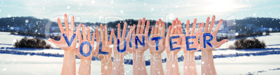 Many Hands Building Word Volunteer, Winter Scenery As Background