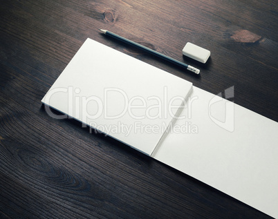 Notebook, pencil and eraser
