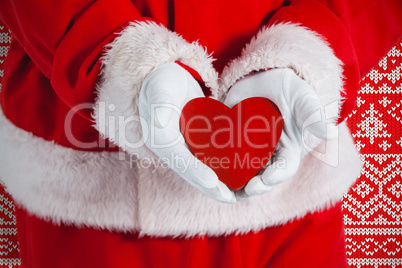 Composite image of santa claus showing red heart shape