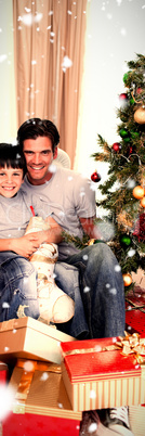 Composite image of happy family with lots of christmas presents