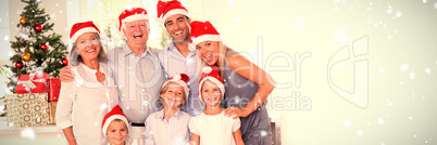 Composite image of family posing for photo
