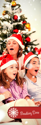 Composite image of extended family singing carols